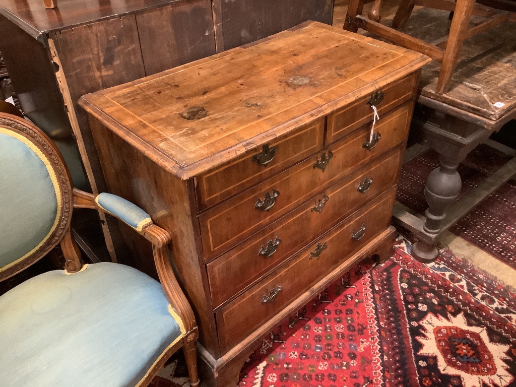 An 18th century banded walnut chest, width 95cm, depth 51cm, height 90cm